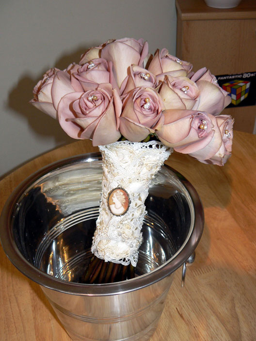 Satin and lace bouquet wrap with crystal embellishment