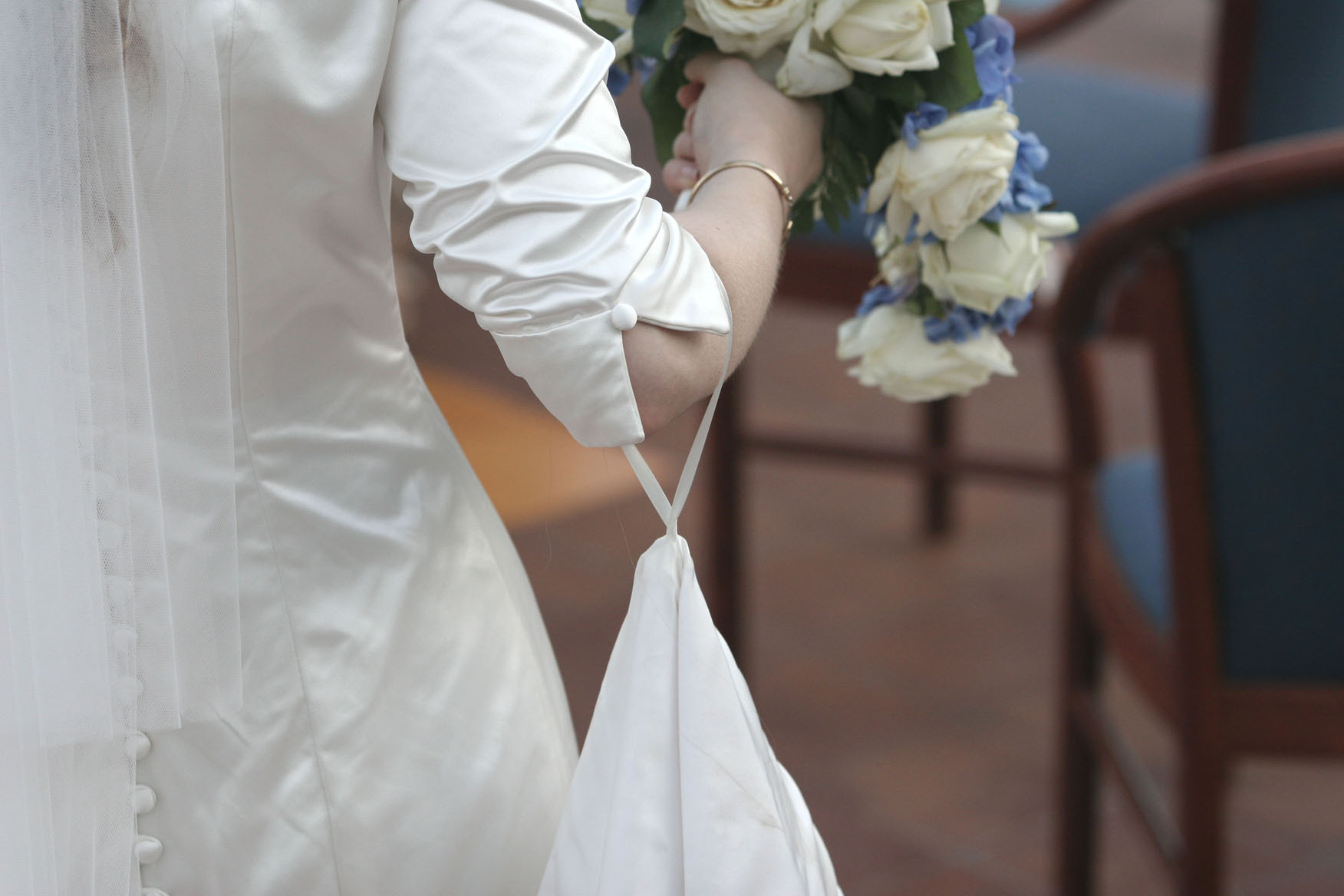 silk duchess satin wedding dress with handmade button detail